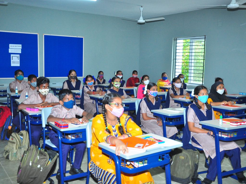 35Class room pic with yellow dressed girl